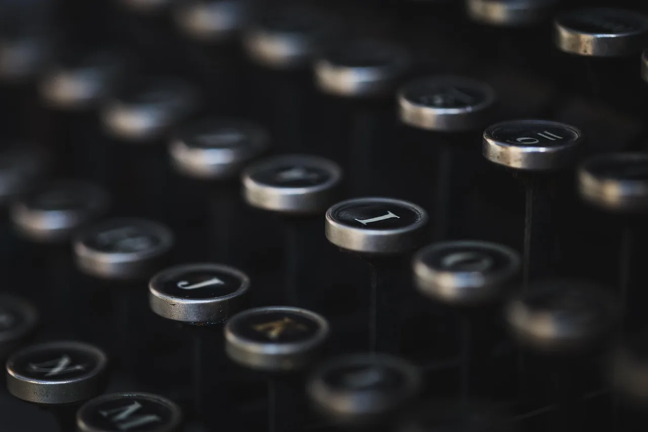 typewriter, vintage, keyboard, letter, writing, business, office, dark, mood, black, old, antique, retro, typewriter, typewriter, keyboard, writing, writing, writing, writing, writing, business, office. Create company descriptions that match the whole plan
