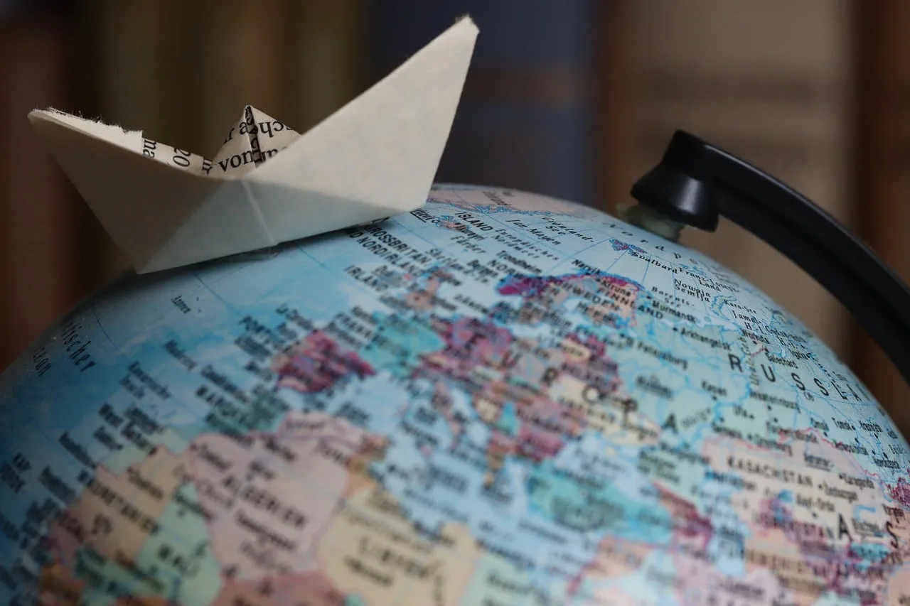world travel, ocean, boat, ship, globe, atlantic, paper, oregami, symbol, close up, paper ship, paper boat, nature, folds. Sales and marketing plans template for buyer, quote and repeat