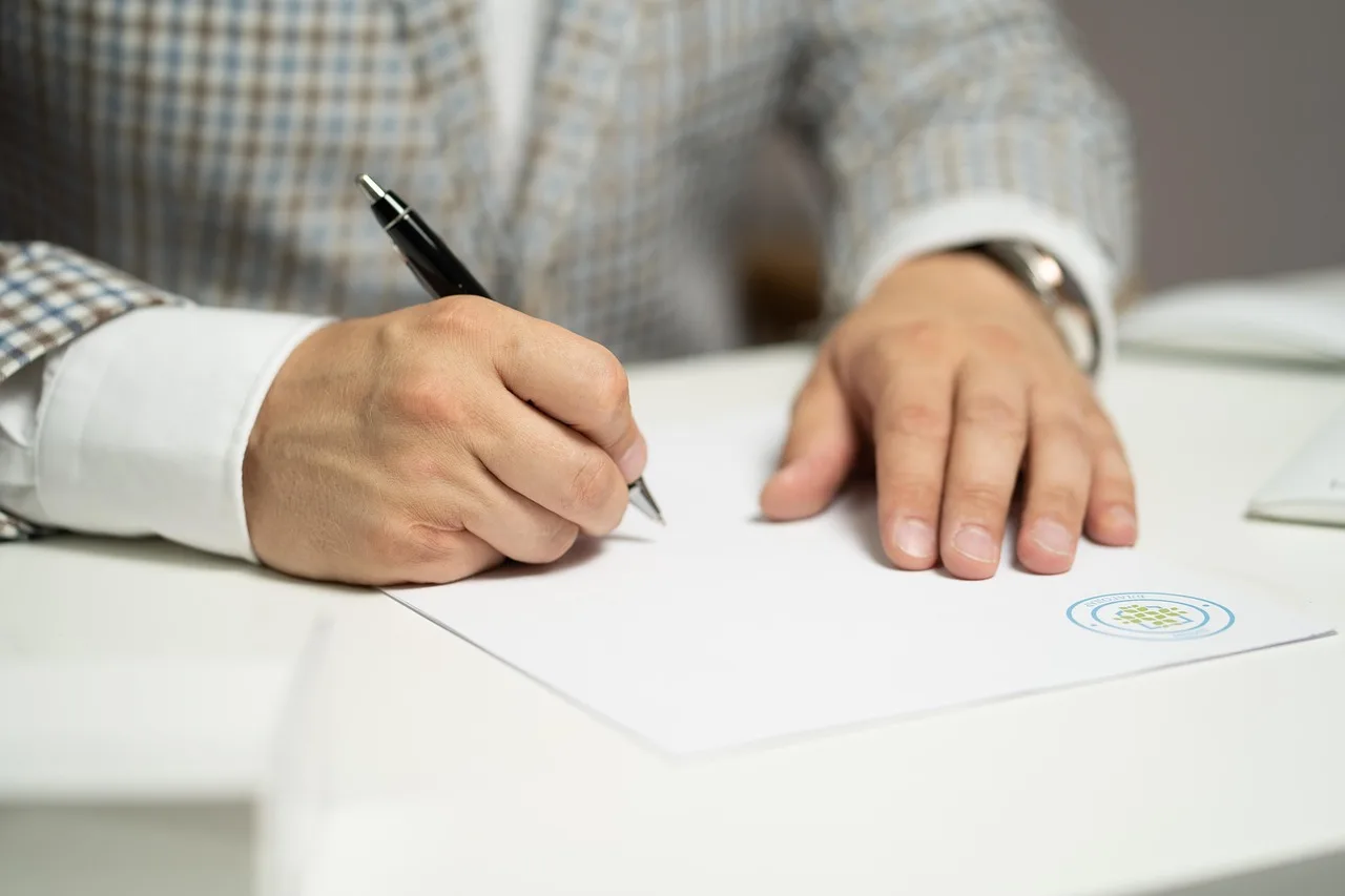 man, sign, paper, write, document, contract, signing, agreement, signature, signing document, signing contract, signing paper, sign, contract, contract, contract, contract, contract, signing, agreement, signature, signature. SBA loan file: what lenders check behind a business plan, and the forms and terms to confirm