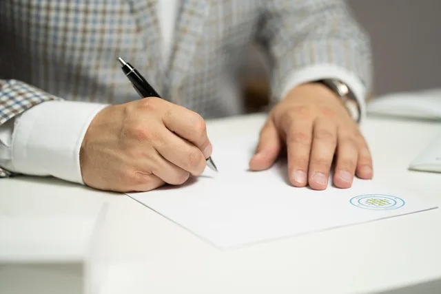 man, sign, paper, write, document, contract, signing, agreement, signature, signing document, signing contract, signing paper, sign, contract, contract, contract, contract, contract, signing, agreement, signature, signature. SBA loan file: what lenders check behind a business plan, and the forms and terms to confirm
